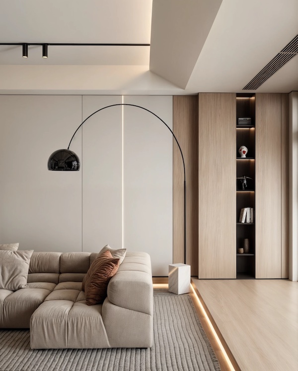 Гостиная, угловой диван, шкаф с книгами, изогнутый торшер, трековые споты