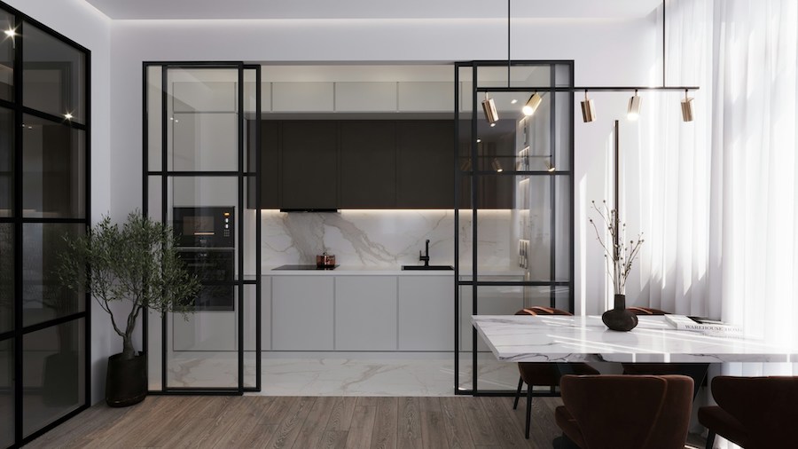 Пространство кухни-гостиной разделено стеклянными раздвижными дверями, встроенная кухня, обеденный стол с мраморной столешницей, , ваза с сухоцветами, мягкие стулья, растение в кашпо, трековые светильники