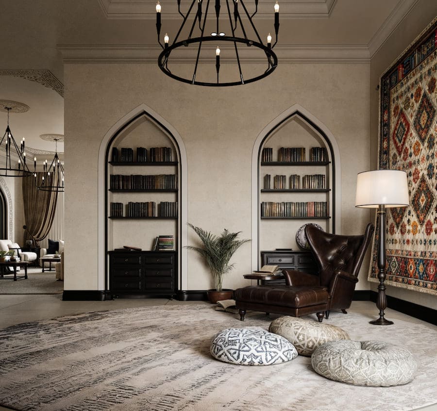 Пример удачной комбинации винтажного с восточным и современным стилями Пространство апартаментов, большие кованые люстры в виде подсвечника, ниши, в которые помещаются комоды и полки с книгами, антикварное кожаное кресло с банкеткой для ног, торшер с абажуром, ковер и бескаркасные кресла-плюшки с восточными орнаментами