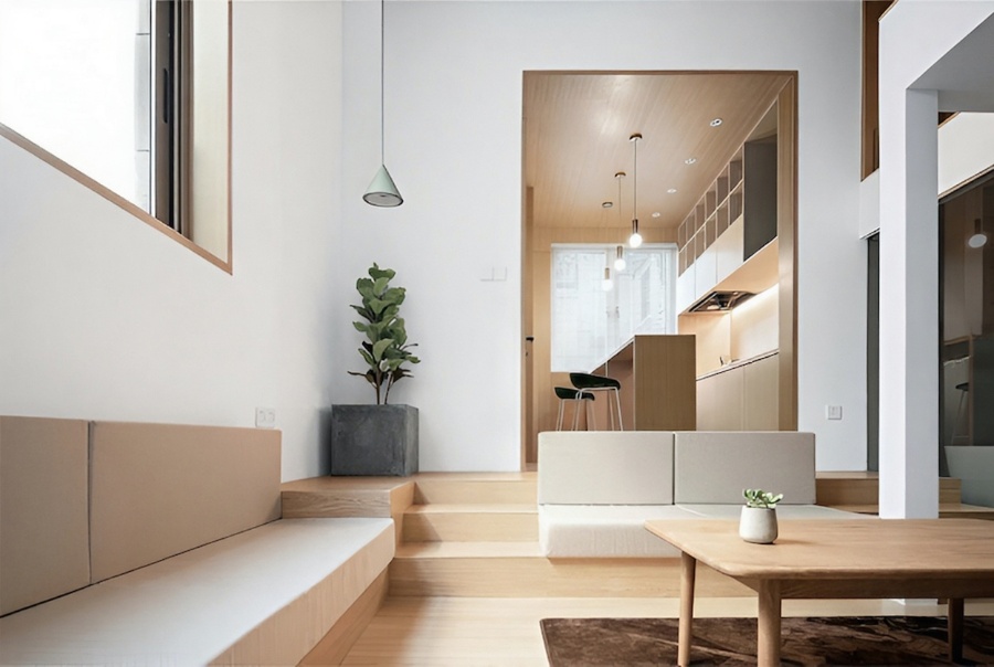 Разноуровневое пространство и единая цветовая гамма отдельных помещений создают гармоничный и стильный интерьер квартиры Кухня с барной стойкой, гостиная с обеденным столом, диванами, ступени, кашпо с растением