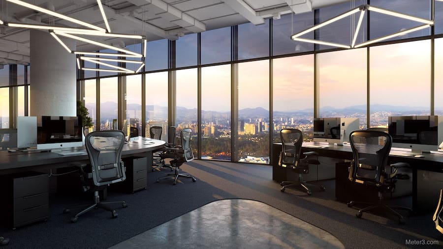 Столы в офисе с видом на город