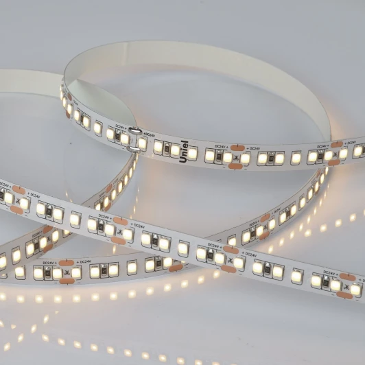 ULS-2835-168LED/m-10mm-IP20-DC24V-14W/m-5M-3000K катушка в герметичной упаковке Светодиодная лента Uniel ULS-2835-168LED/m-10mm-IP20-DC24V-14W/m-5M-3000K катушка в герметичной упаковке