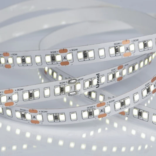 ULS-2835-168LED/m-10mm-IP20-DC24V-14W/m-5M-6500K катушка в герметичной упаковке Светодиодная лента Uniel ULS-2835-168LED/m-10mm-IP20-DC24V-14W/m-5M-6500K катушка в герметичной упаковке