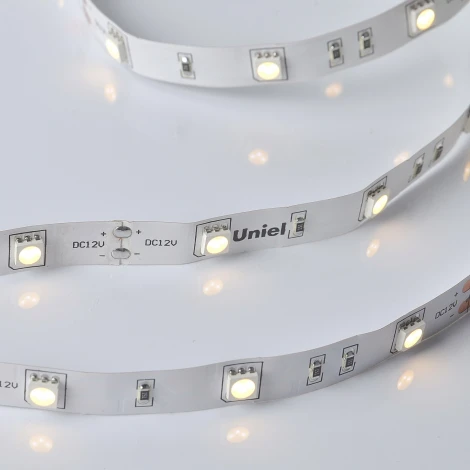 Светодиодная лента Uniel ULS-M22-5050-30LED/m-10mm-IP20-DC12V-7,2W/m-5M-3000K PROFI катушка в герметичной упаковке