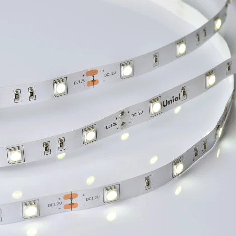 Светодиодная лента Uniel ULS-M22-5050-30LED/m-10mm-IP20-DC12V-7,2W/m-5M-6500K PROFI катушка в герметичной упаковке
