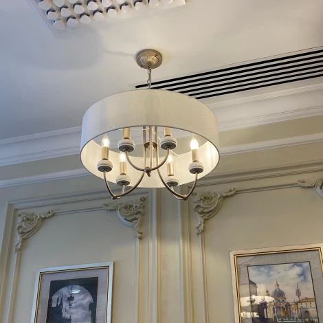 Лампочка светодиодная свеча на ветру прозрачная E14 9W 4000K Uniel LED-CW35-9W/4000K/E14/CL/DIM GLA01TR
