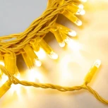 Гирлянда Нить с колпачком 10м тепло-белая 24В, 100 LED, провод золотой ПВХ, IP65 Laitcom PST100CAP-12-1WW
