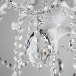 Подвесная люстра Eurosvet Veletta 10108/5 белый/прозрачный хрусталь Strotskis (220V, хрусталь Strotskis, на цепи, свеча)