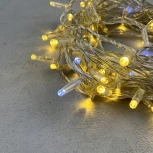 Гирлянда Нить с колпачком 10м золотой с мерцанием белого диода 24В, 100 LED, провод прозрачный ПВХ, IP65 Laitcom PST100BLWCAP-10-1GL