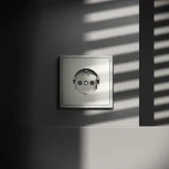 Розетка с заземлением и шторками (сталь) Voltum S70 VLS040205