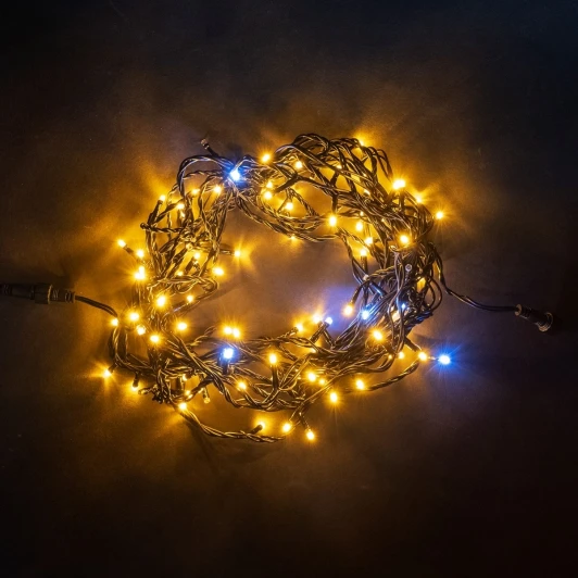 PST100BLW-11-1Y Гирлянда Нить 10м Желтая с Мерцанием Белого Диода 24В, 100 LED, Провод Черный ПВХ, IP54