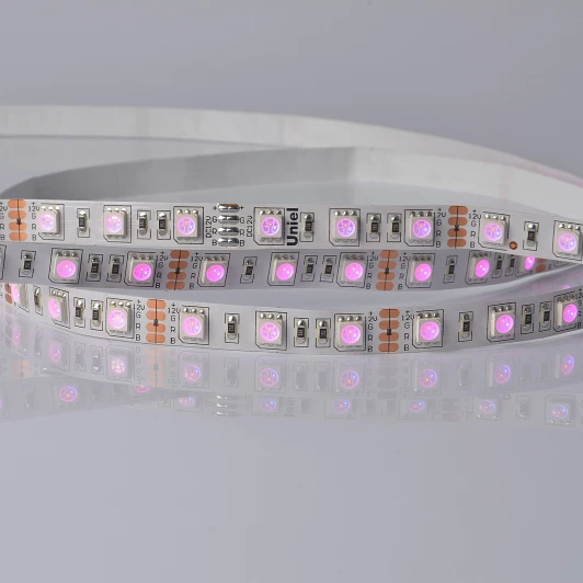 ULS-5050-60LED/m-10mm-IP20-DC24V-14,4W/m-5M-RGB катушка в герметичной упаковке Гибкая светодиодная лента на самоклеящейся основе. катушка 5 м, мультиколор. Uniel ULS-5050-60LED/m-10mm-IP20-DC24V-14,4W/m-5M-RGB катушка в герметичной упаковке