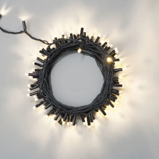 ECO100-1-1WW Гирлянда Нить 10м тепло-белая 24В, 100 LED, провод черный каучук 2,3мм, IP65 Laitcom ECO100-1-1WW