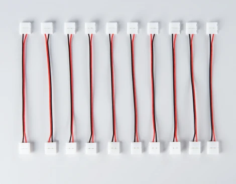 Соединитель гибкий Ambrella Illumination GS7601 двухсторонний для светодиодной ленты 5050 12/24V (2 конт.) 150 мм