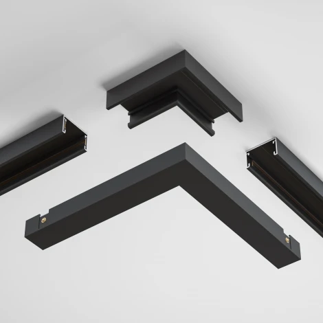 Коннектор угловой, накладной, черный Maytoni Accessories for tracks Basity TRA172CL-11B