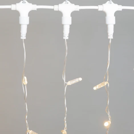 Гирлянда Занавес с колпачком 2 x 3 м тепло-белый с мерцанием белого диода 220В, 600 LED, провод прозрачный ПВХ, IP65 Laitcom PCL602BLWCAP-10-2WW