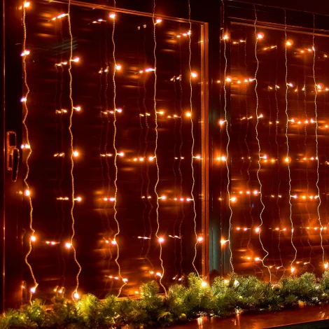 Занавес светодиодный, 3х2м. 160 светодиодов. Янтарный свет. Провод прозрачный Uniel ULD-C3020-160/DTA AMBER IP20