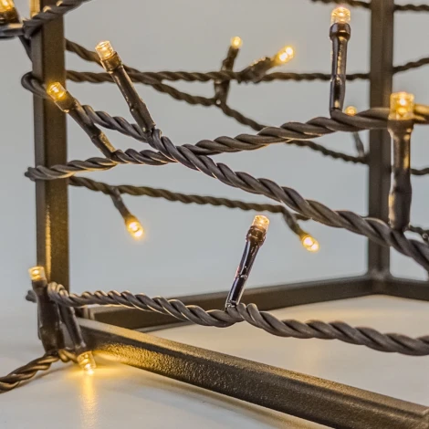 Гирлянда Нить 10м тепло-белая 220В, 100 LED, провод черный ПВХ, IP54 Laitcom PST100-11-2WW