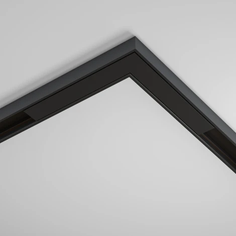 Коннектор угловой, накладной, черный Maytoni Accessories for tracks Basity TRA172CL-11B