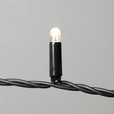 Гирлянда Нить 10м тепло-белая 24В, 100 LED, провод черный каучук 2,3мм, IP65 Laitcom ECO100-1-1WW