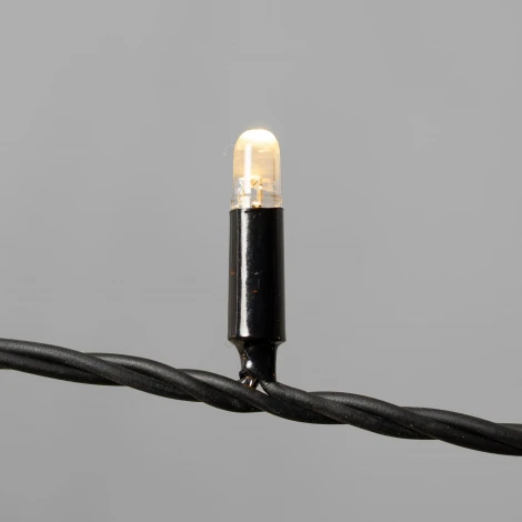 Гирлянда Нить 10м тепло-белая с мерцанием белого диода 220В, 100 LED, провод черный каучук 2,3мм, IP65 Laitcom ECO100BLW-1-2WW