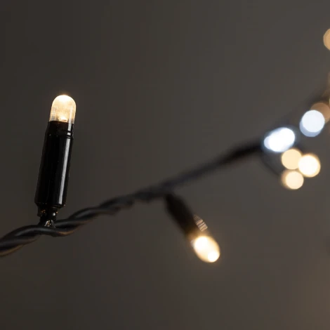 Гирлянда Нить 10м тепло-белая с мерцанием белого диода 220В, 100 LED, провод черный каучук 2,3мм, IP65 Laitcom ECO100BLW-1-2WW
