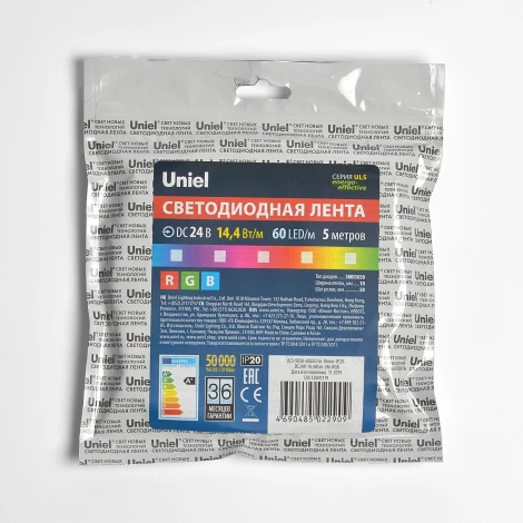 Гибкая светодиодная лента на самоклеящейся основе. катушка 5 м, мультиколор. Uniel ULS-5050-60LED/m-10mm-IP20-DC24V-14,4W/m-5M-RGB катушка в герметичной упаковке