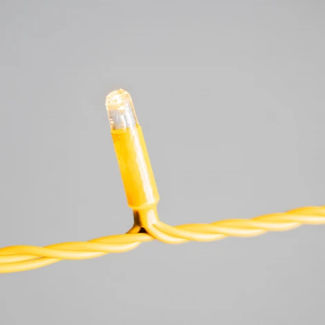 Гирлянда Нить с колпачком 10м тепло-белая 24В, 100 LED, провод золотой ПВХ, IP65 Laitcom PST100CAP-12-1WW