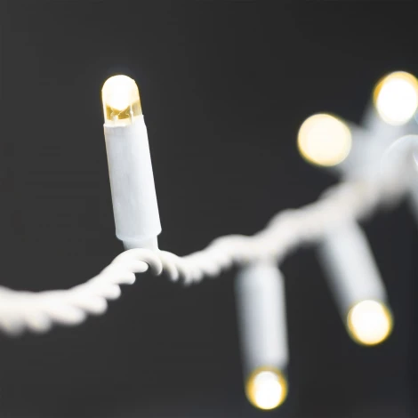 Гирлянда Нить 10м тепло-белая 24В, 100 LED, провод белый каучук 2,3мм, IP65 Laitcom ECO100-8-1WW