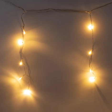 Бахрома светодиодная с эффектом мерцания, 12м. соединяемая, 195 светодиодов, теплый белый свет Uniel ULD-B12006-195/TTK WARM WHITE IP44