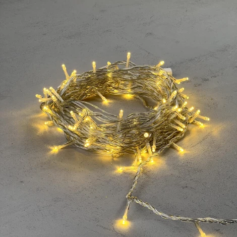 Гирлянда Нить 10м золотой 24В, 100 LED, провод прозрачный ПВХ, IP54 Laitcom PST100-10-1GL